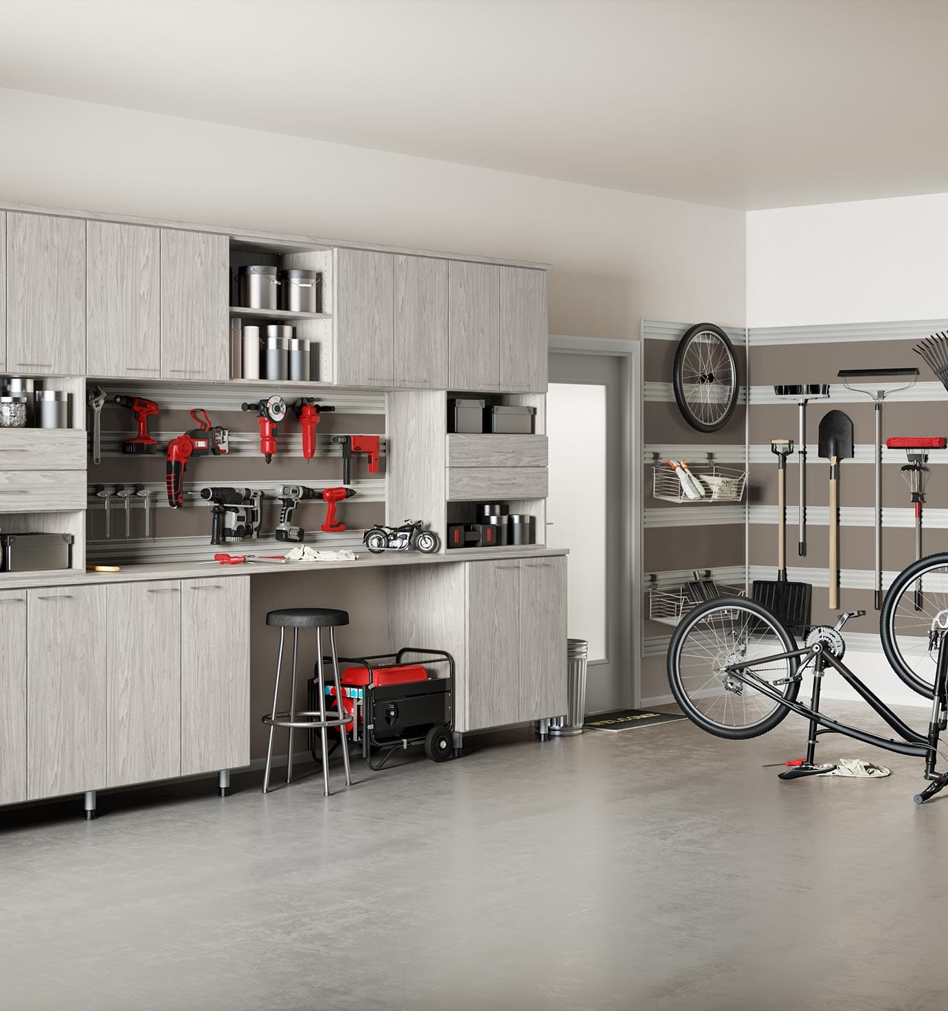 View of a garage transformed into a workshop with wooden cabinets, red power tools, a generator, a stool, and a bike mounted on a repair stand. Side shelves hold additional tools and supplies.