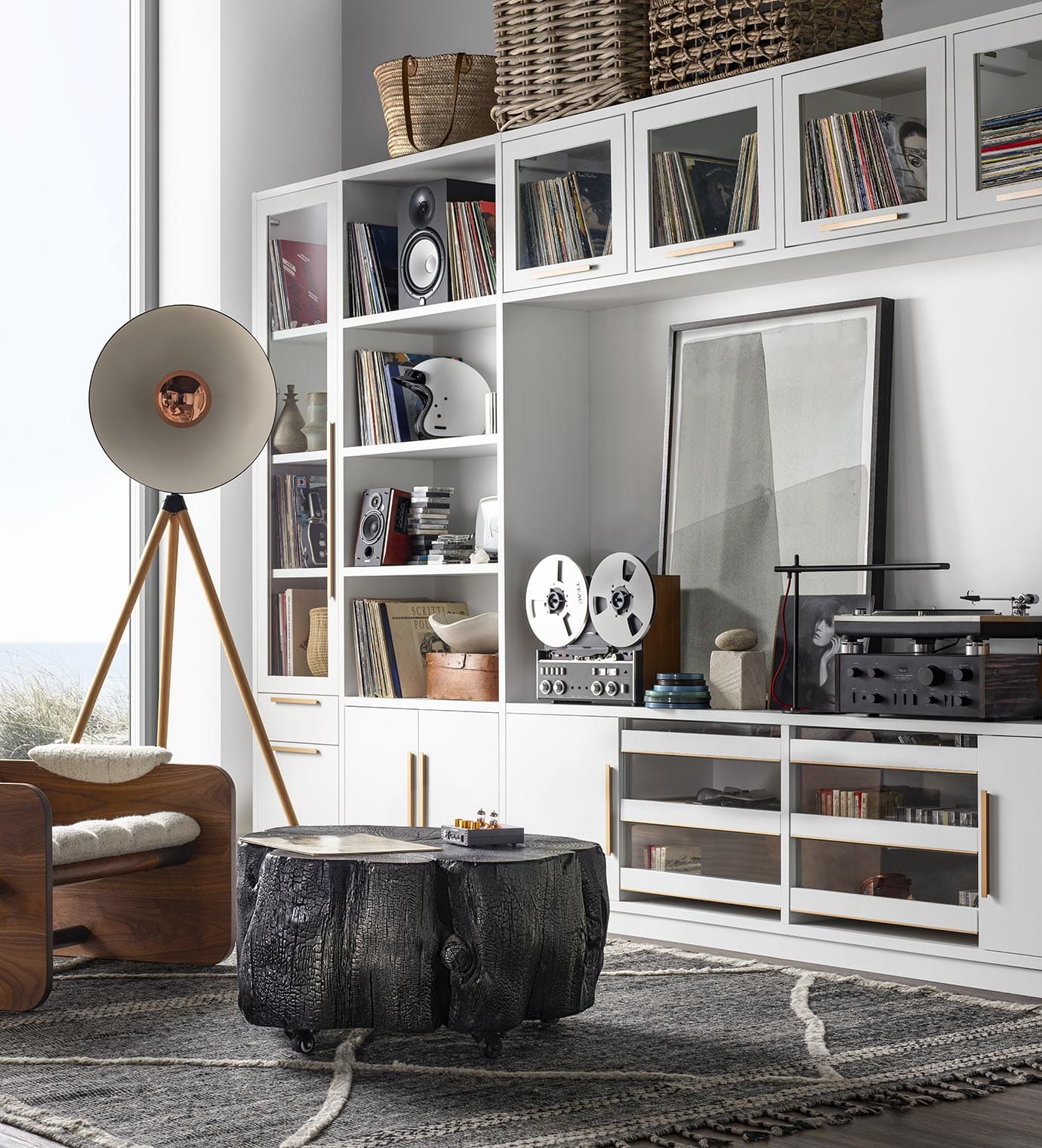 Retro-designed loft with custom entertainment center storage in white wood finish by California Closets
