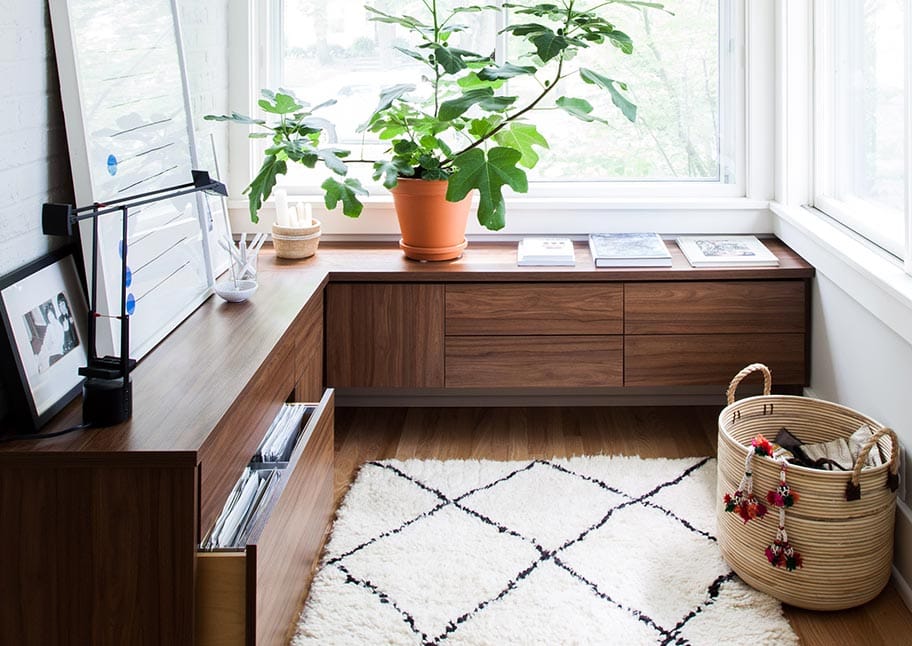 Custom art office area for small space with drawers designed by California Closets