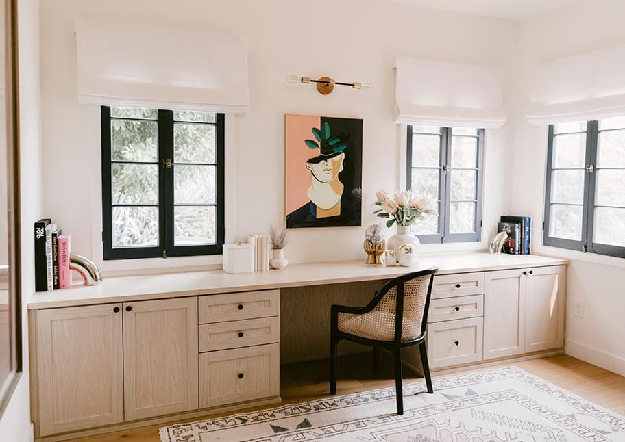 Natural wood custom entertainment center from with storage by California Closets