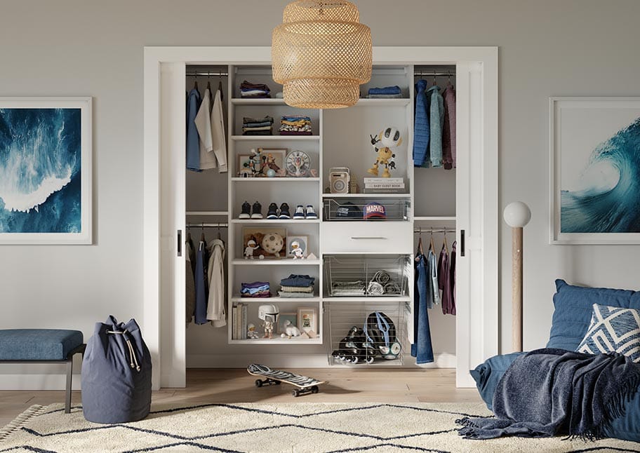 Custom closet for teen with storage space in a coastal design by California Closets