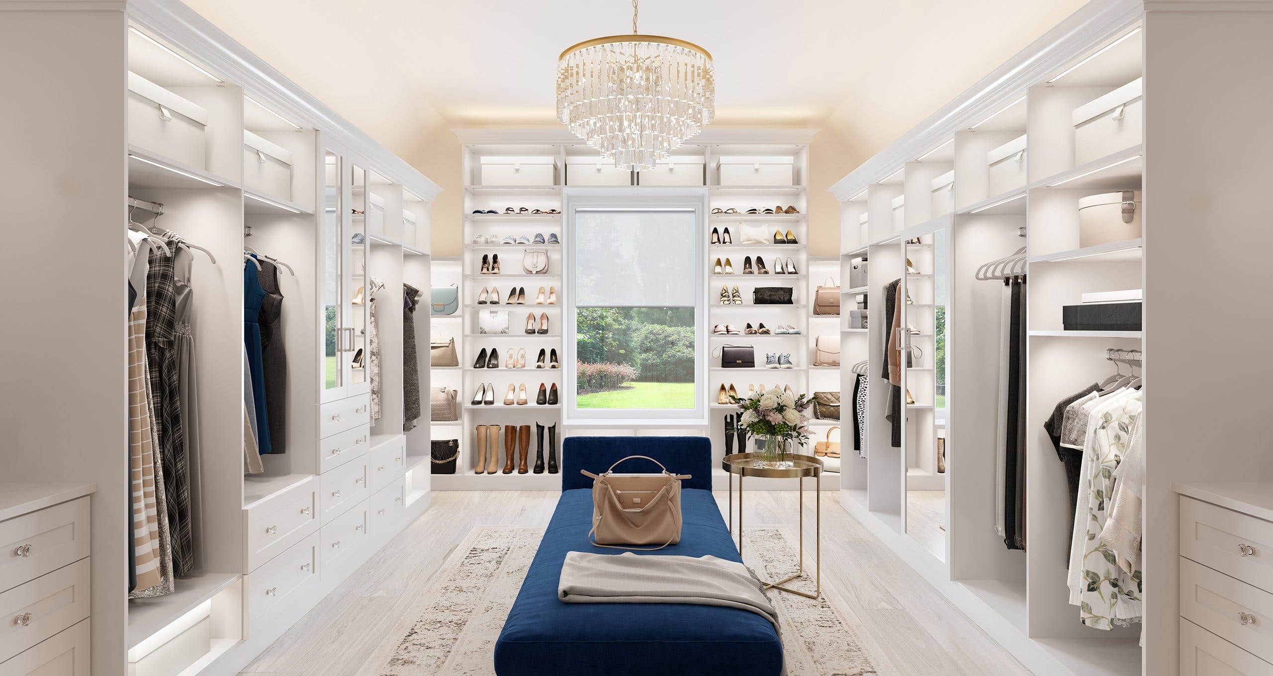 Luxe walk in closet with shoe storage, custom cabinets and open shelving by California Closets