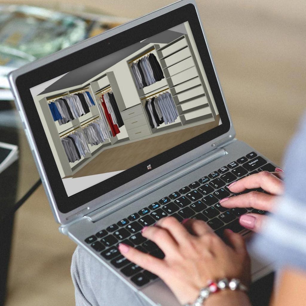 Designer showing 3D design created using proprietary software by California Closets